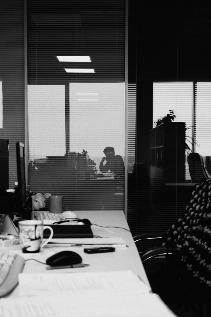A quiet, minimal workspace in black and white