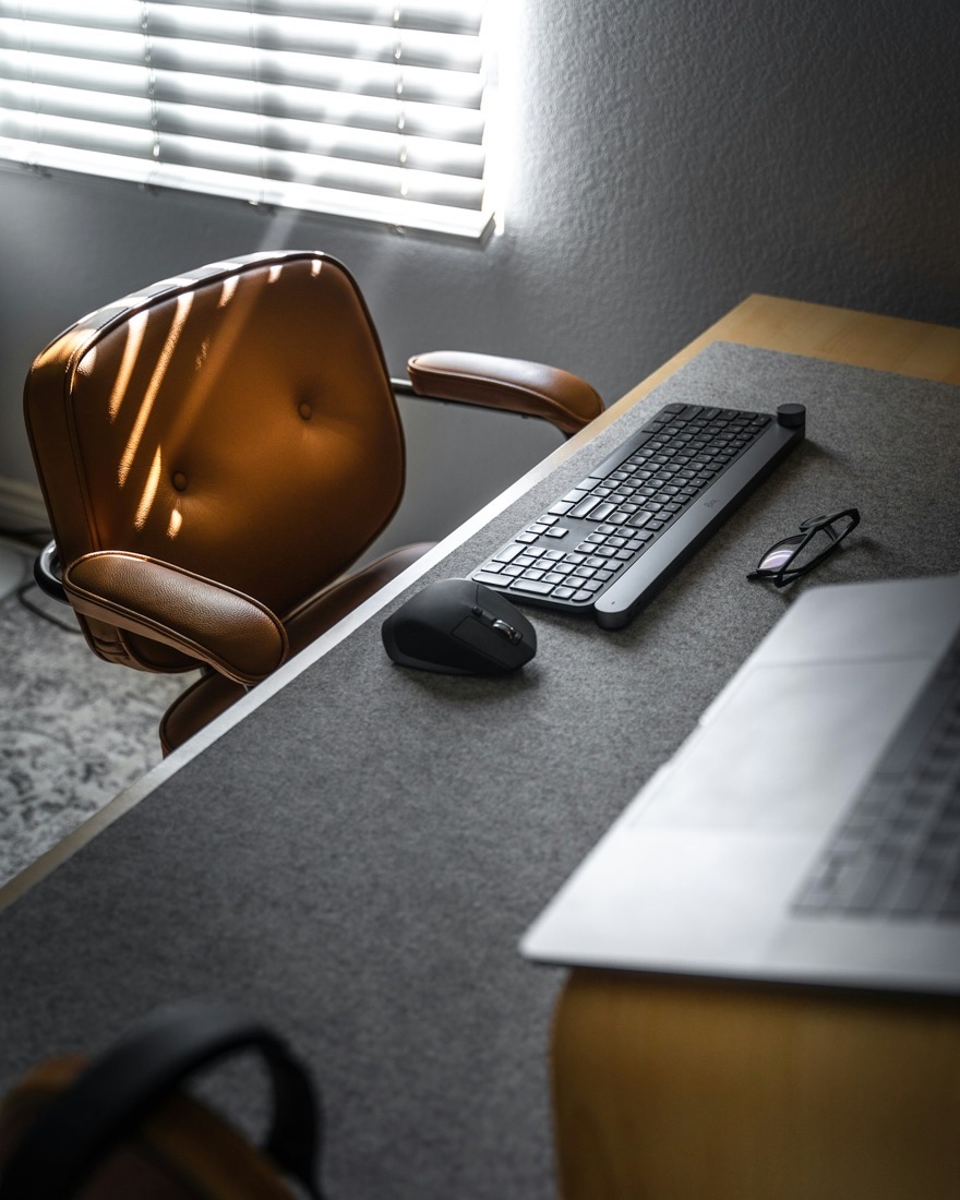 A quiet, considered workspace with warm natural light